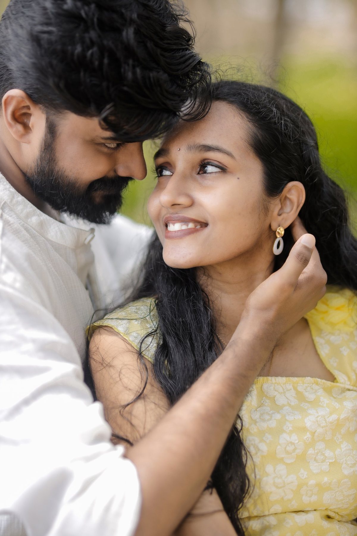 Close-up of the couple smiling at each other